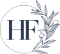 Hannah Fraher Interiors logo: dark blue HF initials, circular frame, and an olive branch.